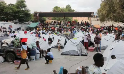  ?? Photograph: Ralph Tedy Erol/ Reuters ?? People fleeing gang violence take shelter at a sports arena, in Port-au-Prince, Haiti, 1 September 2023.