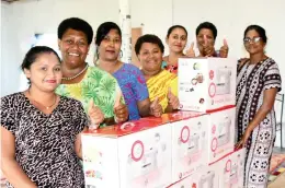  ?? Photo: SUPPLIED ?? Members of the Sew True Women’s Club in Nasinu after receiving the sewing machines from the Minister for Women, Children and Poverty Alleviatio­n, Rosy Akbar.