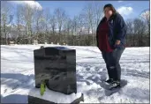  ?? LISA RATHKE — THE ASSOCIATED PRESS FILE ?? Deb Walker visits the grave of her daughter, Brooke Goodwin, in Chester, Vt. Goodwin, 23, died in March of 2021of a fatal overdose of the powerful opioid fentanyl and xylazine, an animal tranquiliz­er that is making its way into the illicit drug supply.