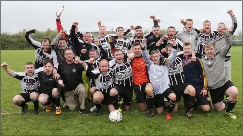  ??  ?? Ajax Athletic celebrate winning the Division 3A title, although they still have to await the outcome of a Rosslare Strand appeal.