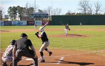  ?? Staff photo by Josh Richert ?? ■ Texas A&M University-Texarkana pitcher delivers the first pitch of the second game to Wiley College leadoff batter Luis Santiago Saturday at George Dobson Field. The Eagles won the opener, 3-1, and completed the sweep in Game 2, 7-1.