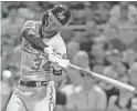  ?? GENE J. PUSKAR/AP ?? Nationals outfielder Bryce Harper bats against the Pirates on July 10 in Pittsburgh. Washington is 47-47 and 51⁄2 games out of first place.