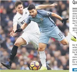  ??  ?? Manchester City’s Sergio Aguero (right) in action with Swansea City’s Federico Fernandez during the English Premier League match at Etihad Stadium in this Feb 5 file photo. — Reuters photo