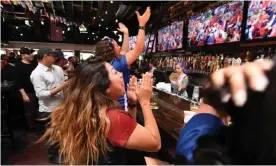  ??  ?? USA fans watch the Women’s World Cup quarter-final in a Los Angeles bar. Photograph: Robyn Beck/AFP/Getty