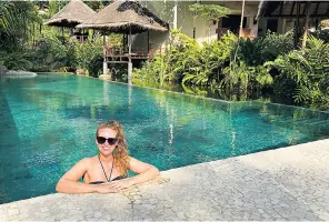  ?? ?? j ‘It’s a safe space to feel vulnerable – and a pretty one at that’: Hannah relaxes in the pool