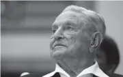  ?? RONALD ZAK/AP FILE ?? George Soros, the billionair­e investor and philanthro­pist, is being falsely accused of orchestrat­ing and funding the protests over police killings in the United States.