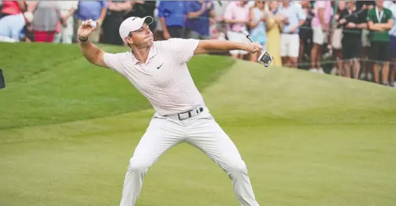  ?? JIM DEDMON-USA TODAY SPORTS ?? Rory McIlroy reacts by throwing his ball after clinching his third Wells Fargo championsh­ip at Quail Hollow Club in Charlotte, N.C., on Sunday.