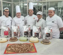  ??  ?? Chef patissier Gaetano Mignano (centre) with Santa Lucia Products director Ray Buttigieg (2nd left) and Goodies Sales manager Rachel Mercieca (2nd right)