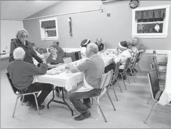  ?? SUBMITTED ?? Members of the Aylesford and District Lions Club got to sit down and enjoy a Christmas dinner.