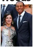  ?? ?? Split: Tiger Woods and his ex Erica Herman