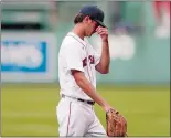  ?? MICHAEL DWYER/AP PHOTO ?? Boston Red Sox starting pitcher Kyle Hart walks off the field after being taken out during the third inning of Thursday’s game against the Tampa Bay Rays in Boston.