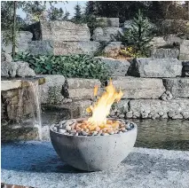  ??  ?? Gather ’round the campfire: The made-in-Canada Serenade fire bowl is billed as offering all the fun of a backyard blaze without ever having to chop wood. It just needs to be hooked to a fuel source, natural gas or propane, and comes in half-a-dozen...