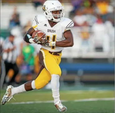  ?? ANTON ALBERT — THE NEWS-HERALD ?? Mitchell Kellogg runs for yardage during Brush’s 52-48 win over Kenston on Sept. 22.