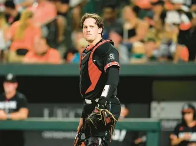  ?? JULIO CORTEZ/AP ?? Orioles catcher Adley Rutschman looks on in the seventh inning of a game against the Yankees on July 28 in Baltimore.