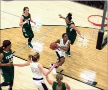  ?? TIM GODBEE / For the Calhoun Times ?? Calhoun’s Erin Davis (center) drives between Adairsvill­e defenders for a bucket in the second half on Tuesday.