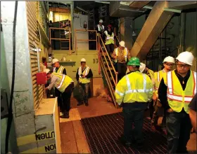  ?? File Photo/NWA Democrat-Gazette/ANDY SHUPE ?? Visitors examine the reactor Jan. 19 during a tour of the shuttered SEFOR nuclear facility near Strickler in southern Washington County. Visit nwadg.com/photos to see more photograph­s from the tour.