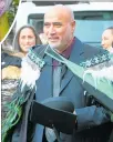  ?? ?? Bazil Hauraki receives a Master of Education degree from the Tai Tokerau Faculty of Education at the graduation ceremony on Wednesday.