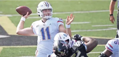  ?? CHRISTOPHE­R HANEWINCKE­L/USA TODAY SPORTS ?? Florida QB Kyle Trask leads the SEC’s top-ranked passing attack.