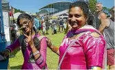  ?? LIAM COURTENAY/STUFF ?? Cecilia Marshal, 10, and Soniya John wait for some Sri Lankan food at the Taranaki MultiEthni­c Extravagan­za.