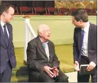  ?? Paul Newberry / Associated Press ?? In this May 5 file photo, Democratic presidenti­al candidate Pete Buttigieg, right, and his husband, Chasten Glezman Buttigieg speak with former President Jimmy Carter at Carter’s Sunday school class in Plains, Ga.