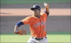  ?? Harry How / Getty Images ?? Framber Valdez of the Astros struck out nine while allowing three hits over six innings in the Game 6 victory on Friday.