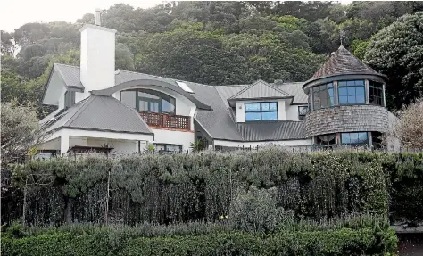  ?? PHOTOS: STUFF ?? This Wellington property, formerly owned jointly by Sir Nga¯ tata Love and the estate of his former partner, Lorraine Skiffingto­n, is for sale.