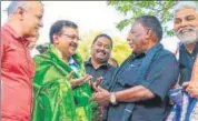  ?? PTI ?? Puducherry CM V Narayanasa­my welcomes Delhi CM Arvind Kejriwal as he arrives to support his ‘dharna’ outside the residence of Puducherry Lt Governor Kiran Bedi on Monday.