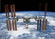  ?? NASA via Getty Images / TNS ?? Dmitry Rogozin, head of the Russian space program, implied that Western sanctions could disrupt the operation of Russian spacecraft servicing the ISS with cargo flights.