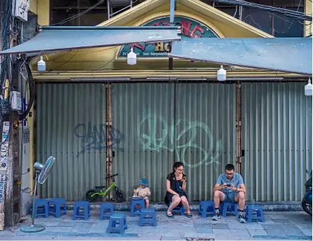  ?? — Bloomberg ?? A closed store in the Old Quarter in Hanoi. The resurgence of the Covid-19 virus in Vietnam and other Asean nations underscore­s the difficulti­es government­s face not only in battling waves of the pathogen but doing so while trying to preserve economic growth.