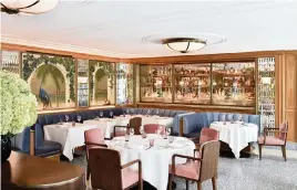  ?? The Surf Club Restaurant via Ken Hayden Photograph­y ?? The Michelin Guide, which rates restaurant­s with prestigiou­s stars, will begin rating Miami, Tampa and Orlando restaurant­s starting in the spring of 2022.