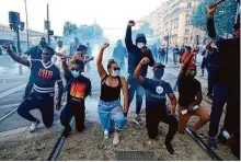  ?? Michel Euler/Associated Press 2020 ?? Protesters rally against racial injustice in Paris in 2020. France has announced a plan to fight discrimina­tion of all kinds.