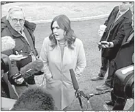  ?? Arkansas Democrat-Gazette/FRANK E. LOCKWOOD ?? White House Press Secretary Sarah Huckabee Sanders blasts Democrats on Tuesday during an impromptu question-and-answer session with reporters in the White House driveway. The day’s press pool reporters, including one from the Democrat-Gazette, were...