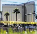  ?? Benjamin Hager ?? Las Vegas Review-journal Police tape blocks a section of West Reno Avenue and Las Vegas Boulevard outside Mandalay Bay on the Strip.