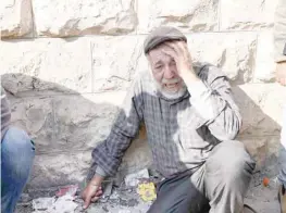  ?? AFP ?? An elderly Palestinia­n man mourns the death of a relative killed during an Israeli raid on a refugee camp in Jenin. —