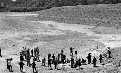  ?? Kent Porter/The Press Democrat via AP ?? In this April 21 file photo, California Gov. Gavin Newsom holds a news conference in the parched basin of Lake Mendocino in Ukiah, Calif., where he announced he would proclaim a drought emergency for Mendocino and Sonoma counties.