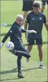  ?? (AFP) ?? Costa Rica’s goalkeeper Keylor Navas (left) controls the ball during a training session at the Al Ahli SC Stadium in Doha on Tuesday.