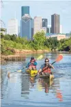  ?? Jon Shapley / Houston Chronicle ?? You can get a great upper body workout when you paddle the scenic waters of the Bayou City.