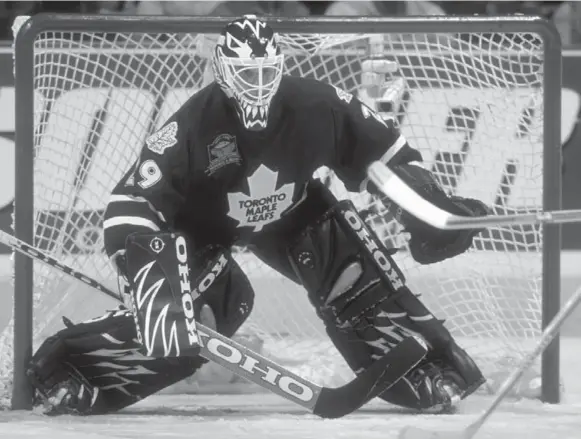  ?? IAN TOMLINSON/GETTY IMAGES FILE PHOTO ?? The equipment worn here by Leafs goalie Felix Potvin back in 1998 bears little resemblanc­e to the monstrous gear worn by today’s NHL keepers. There are those who feel it’s time for a change.