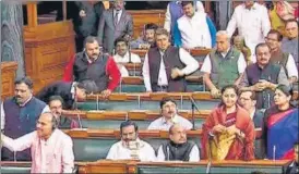  ?? PTI ?? Opposition members protest during the Budget Session in the Lok Sabha on Tuesday. n