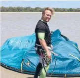  ??  ?? Chris Keeping was kite surfing off Darwin when he ran out of wind and the trouble started.