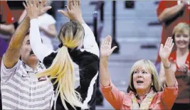  ?? COURTESY UNLV ?? UNLV volleyball coach Cindy Fredrick, right, said she isn’t impressed by the Big Ten and Pac-12 guaranteei­ng that scholarshi­ps can’t be taken away from student-athletes. “To me, it’s just verbiage,” Fredrick said, pointing out that schools are...