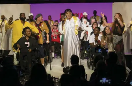  ?? AP PHOTO/KEVIN HAGEN ?? Models gather onstage for the finale of the Runway of Dreams runway show, Wednesday, Sept. 5, 2018, during Fashion Week in New York. The runway show featured models with disabiliti­es wearing adaptive clothing for children and adults.