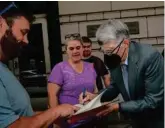  ?? MANDEL NGAN/AFP VIA GETTY IMAGES ?? Stephen King signed autographs outside US District Court in Washington, D.C., Tuesday. King testified about his displeasur­e over the proposed merger of Penguin Random House and rival Simon & Schuster.