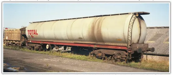  ??  ?? Privately-owned wagons would also come from all over the country to Heywood for repair. In this April 1985 view, a bogie Class A tank usually seen working from the Total Oil Refinery at Immingham waits its turn to enter the wagon works along side a two-axle PRA, a type used to carry china clay from Cornwall to Scotland.