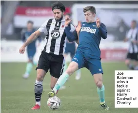  ??  ?? Joe Bateman wins a tackle against Harry Cardwell of Chorley.