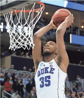  ?? CHARLES ?? Duke forward Marvin Bagley III dunks against Rhode Island during a second-round NCAA Tournament game Saturday in Pittsburgh. LECLAIRE/USA TODAY SPORTS