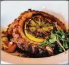  ?? CONTRIBUTE­D BY HENRI HOLLIS ?? An upscale appetizer of charred octopus hits a sophistica­ted note in the sports bar setting of Irby’s Tavern.