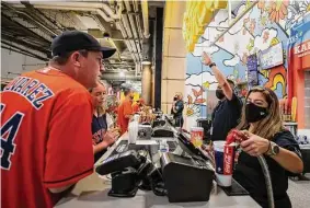 ?? Houston Chronicle file ?? Make sure to walk around Minute Maid Park during a break in the action to check out all the new postseason food offerings from Aramark.