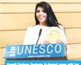  ??  ?? Kuwaiti Engineer Bashayer Al-Awwad poses with her award granted by the UNESCO and WFEO.