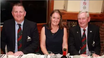  ??  ?? Courtown Captains, Niall Nolan and Catherine Quinn, with the President, Vincent Kavanagh, at the Captains’ dinner.